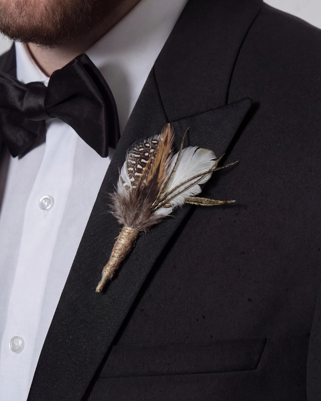 Silver Frost Lapel Pin with Barred Feathers